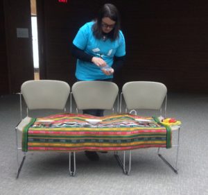 SCMer preparing a table at York University